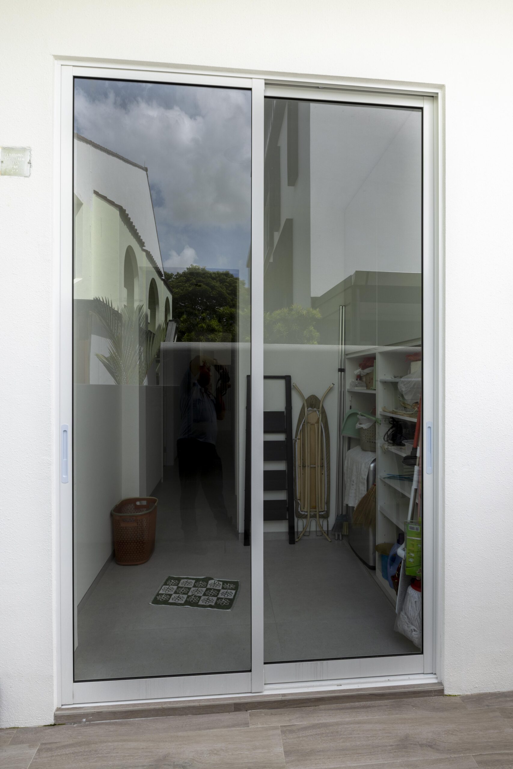 Full window and door system installation at Bedok Ria with sleek white frames