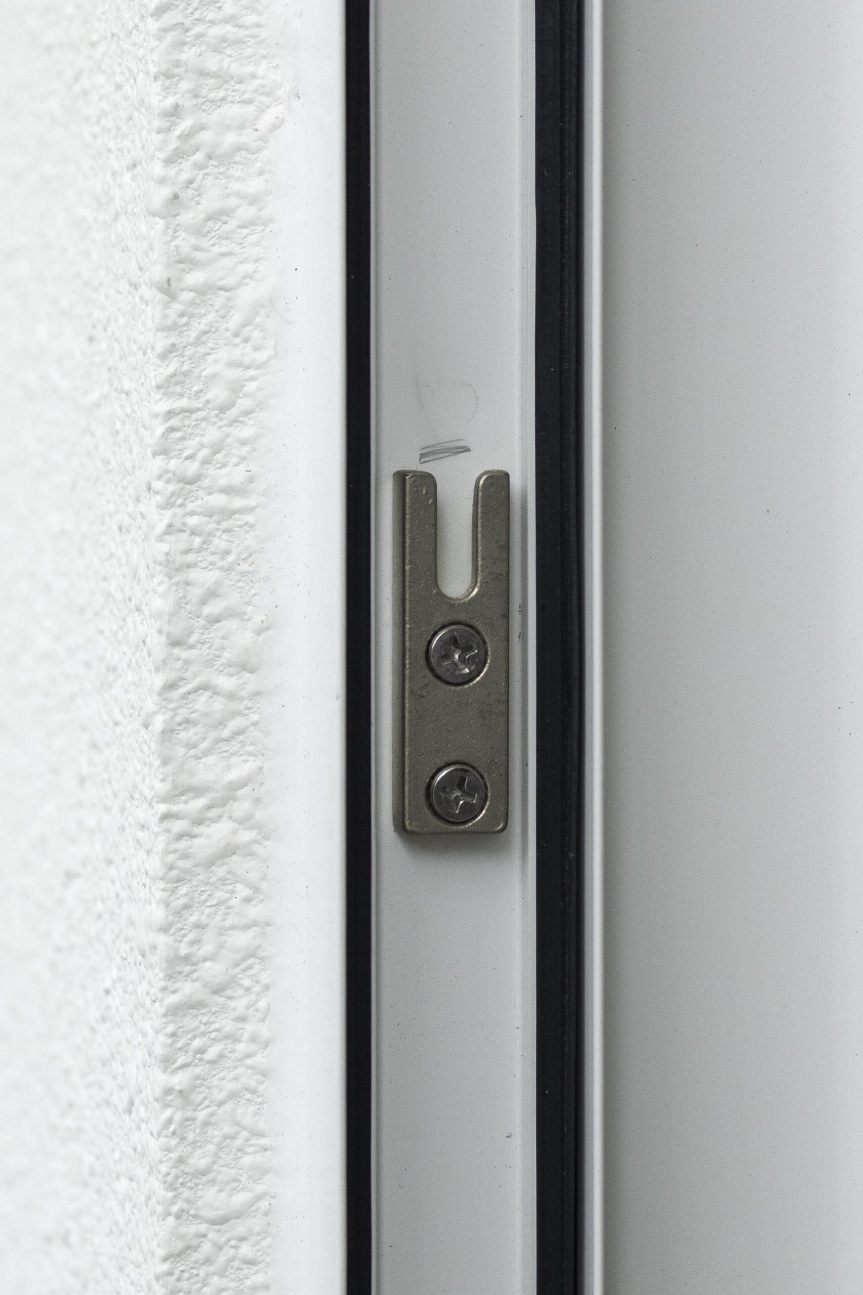 Full window and door system installation at Bedok Ria with sleek white frames