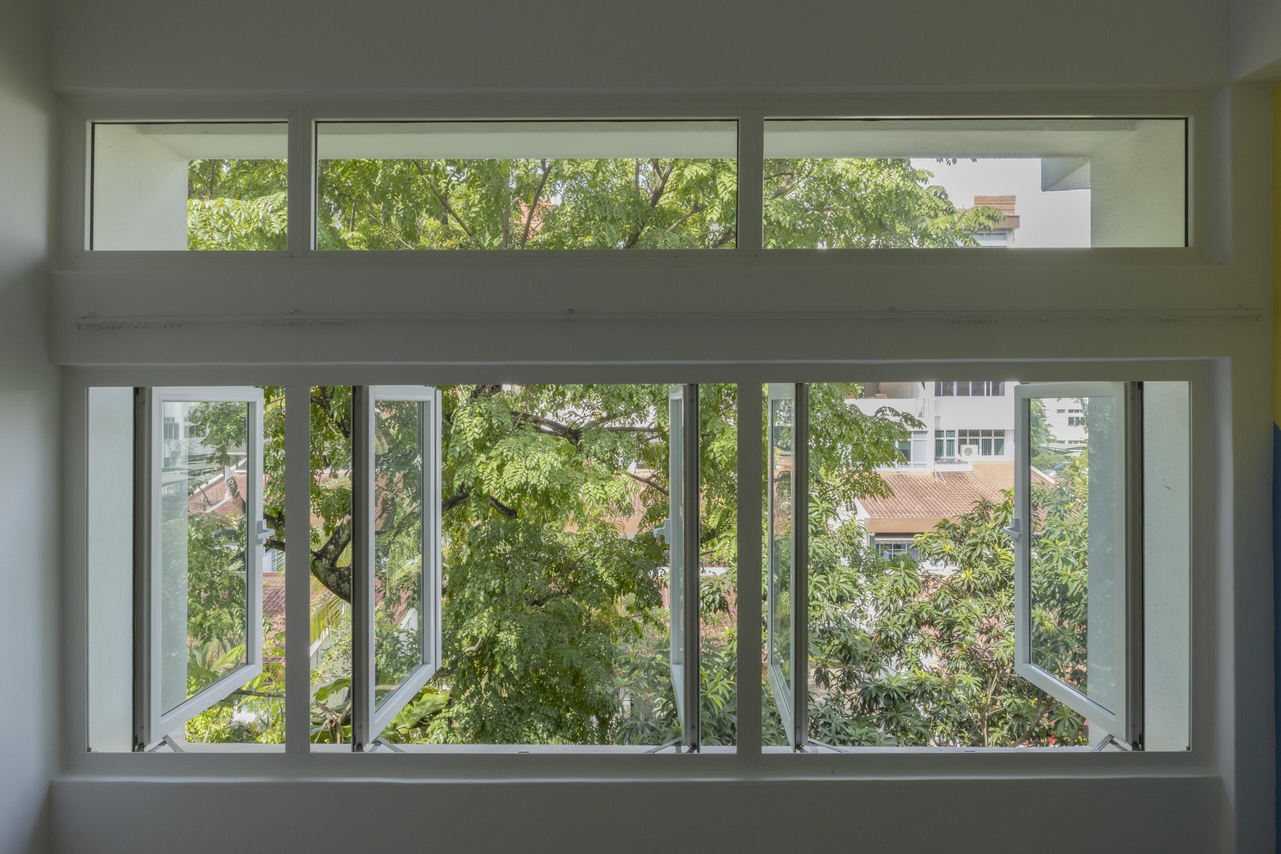 Interior view of Euro profile windows and sliding door in Singapore home