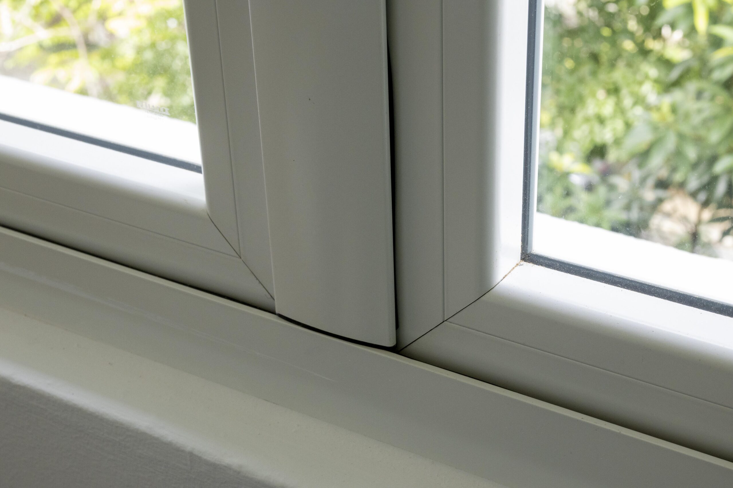 Euro profile aluminium window with 45-degree mitre joint in modern Singapore home