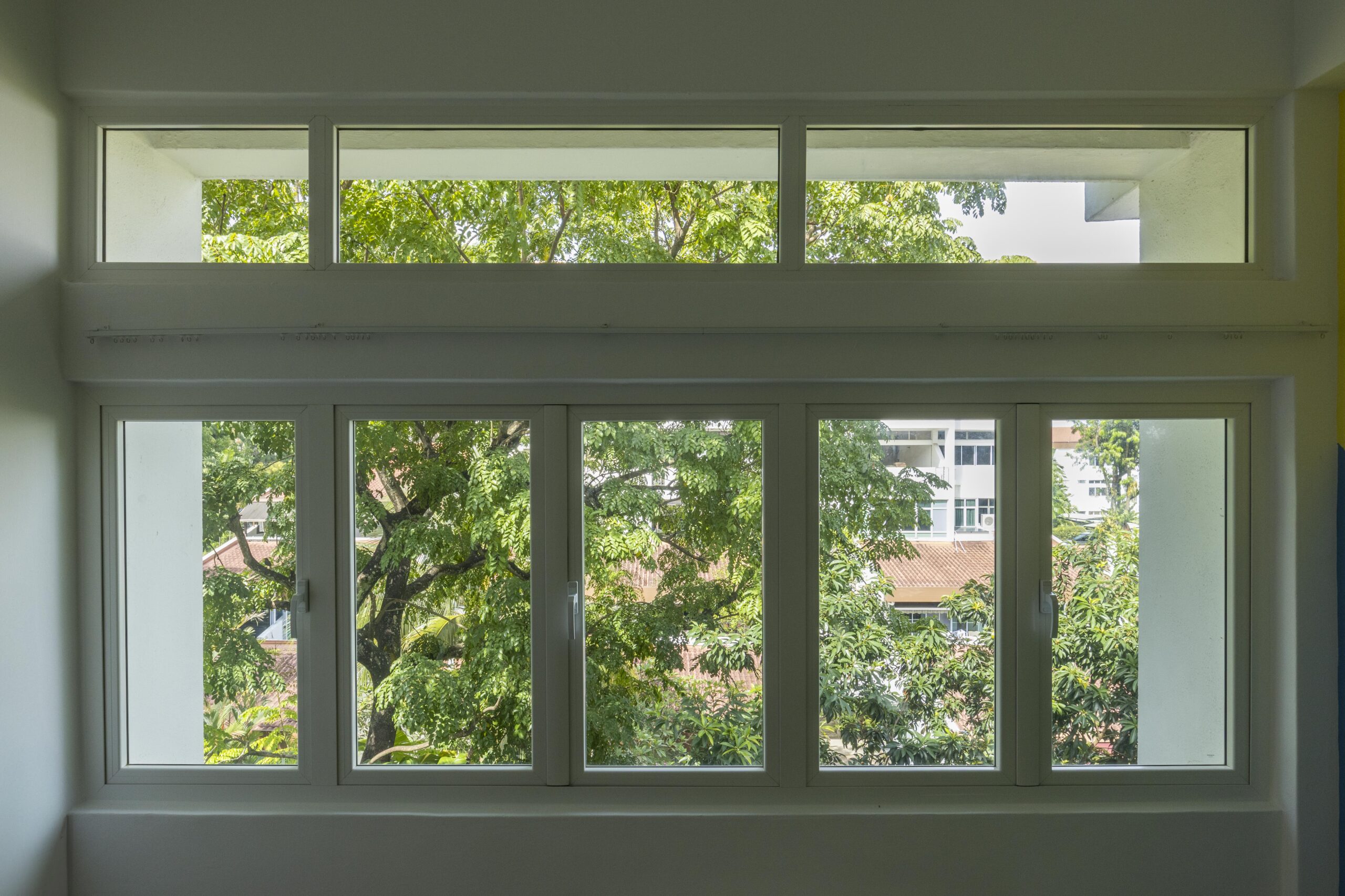 Interior view of Euro profile windows and sliding door in Singapore home